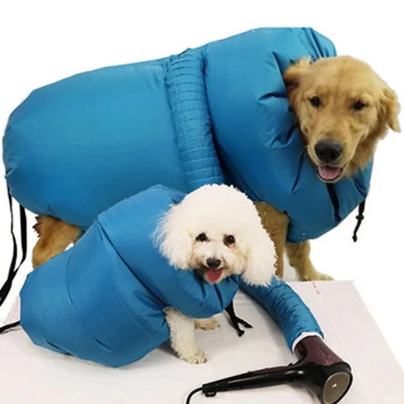 Golden retriever and poodle in blue pet drying bags connected to a hair dryer | Pawnests