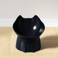 Black cat-ear raised tilted cat bowl on a wooden floor — black | Pawnests